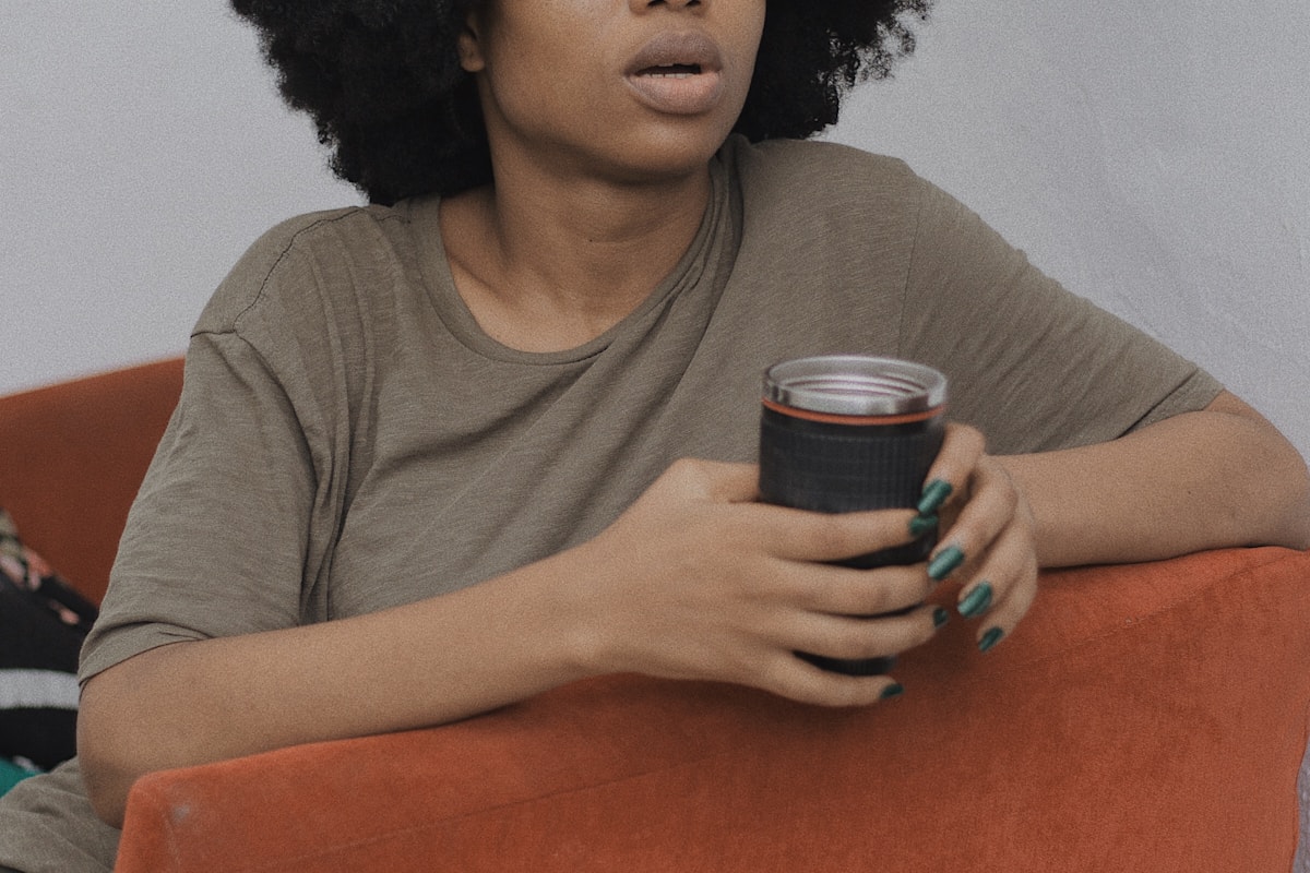 Black woman speaking during a private wellbeing conversation